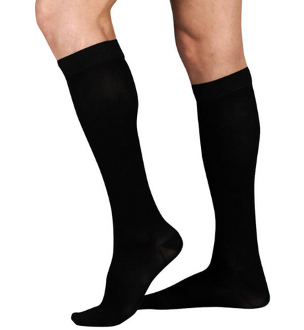 pair of black knee high compression socks